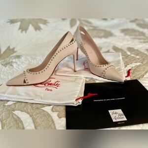 CHRISTIAN LOUBOUTIN
Duvette Spikes 85 leather pumps